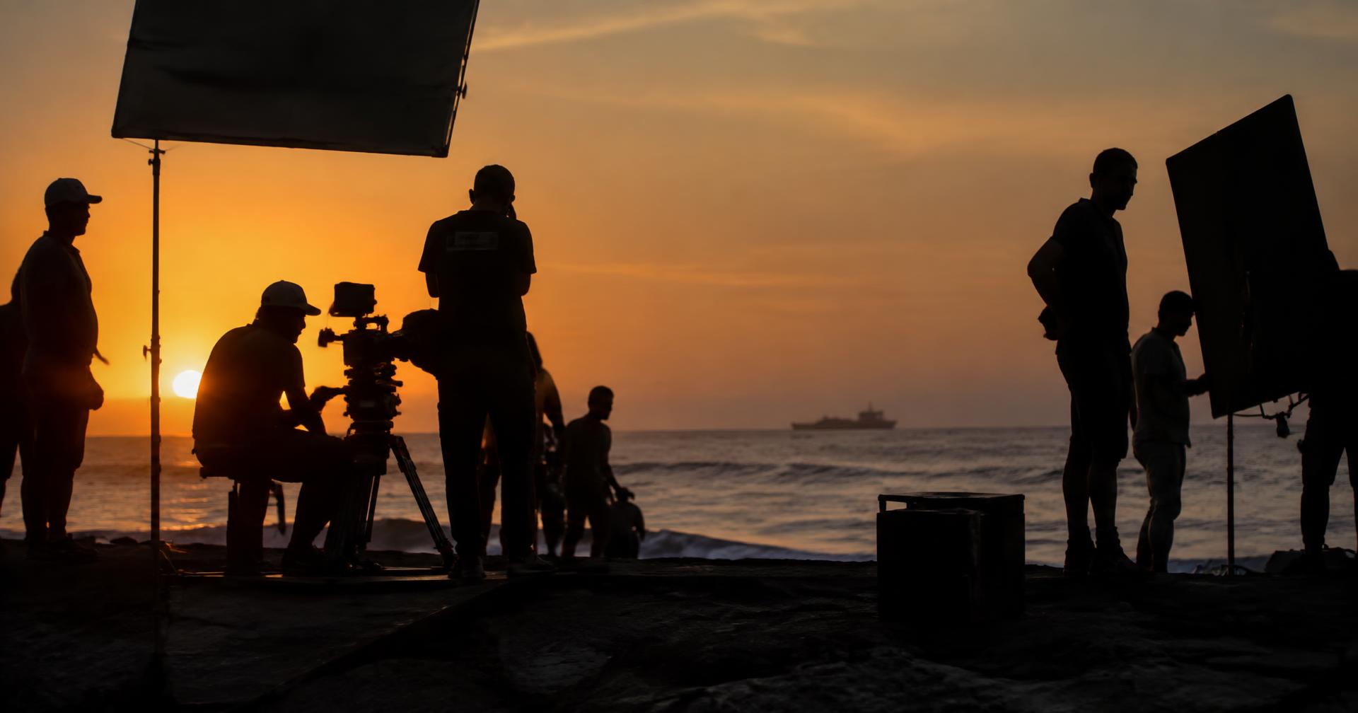 Northstar crew filming on location at golden hour on the Accra coast